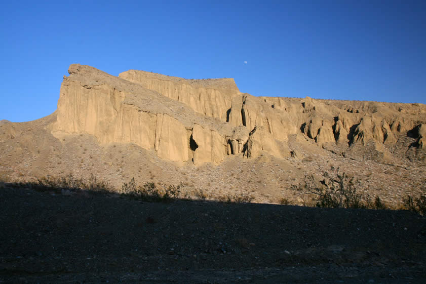 After dropping down the Wildrose Road we stop to take a picture of the mud palisades with the moon rising above them.