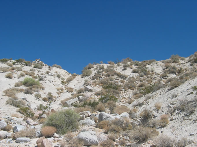 Notch in ridge where travelers on old Spanish trail dug a passage for their wagons.