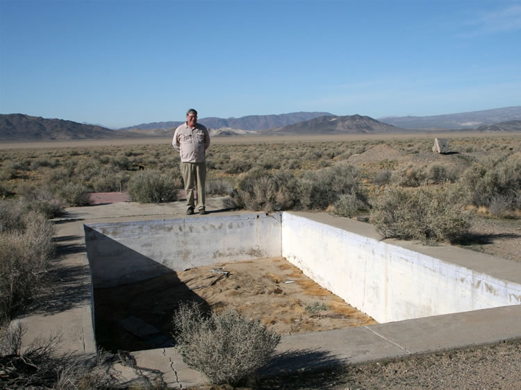 If we could turn the clock back, Mohave would be standing at the edge of the WW II era swimming pool constructed as a diversion for the pilots during their training.  Behind him is the foundation of the bath house.