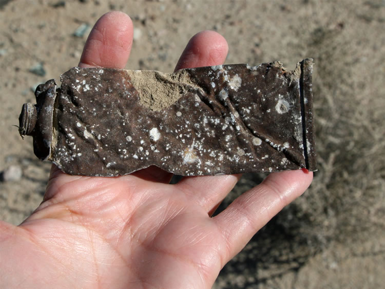 We originally thought that this was an old toothpaste tube, but Mohave reminded us that it was more likely a shaving cream tube.  Such tubes are often found amidst the debris at the old Desert Training Centers where Patton's troops practiced their skills during WW II.