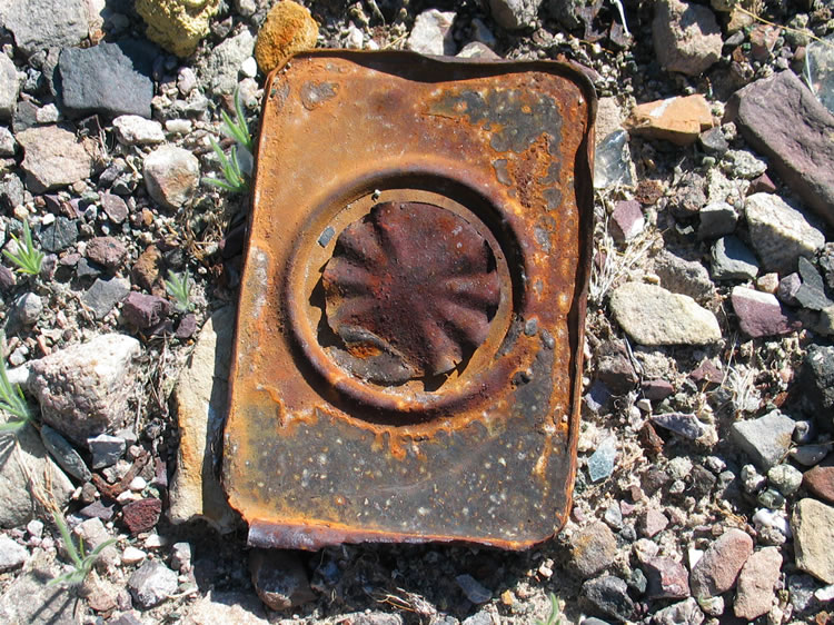 As we explore the dump we begin to find primarily hole and cap cans, which would indicate that this dump was used from the later 1880's to about 1904.