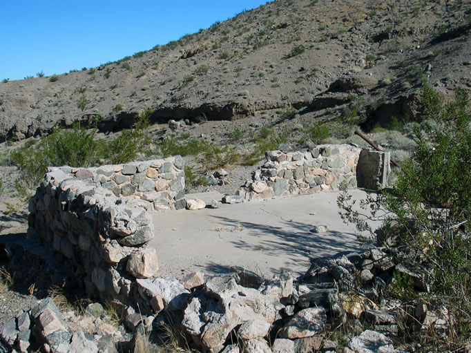 A view of the rear of the cabin foundations.