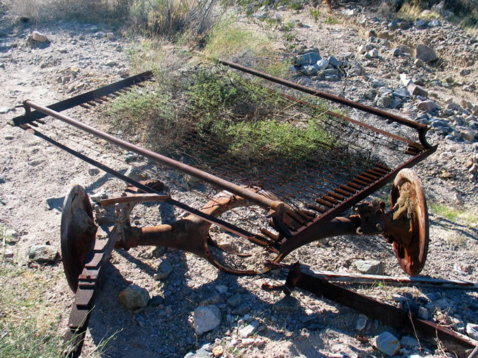 The remains of an interesting heavy duty rear axle and a bed frame.