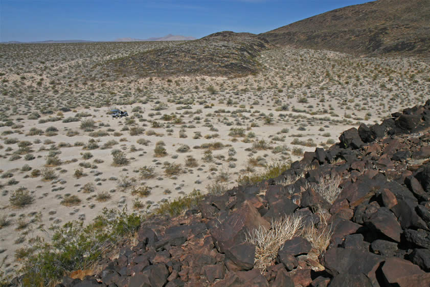 Our new hillside has a good view of the truck and plenty of petroglyphs.  However, the angle of the sun makes photographing most of them almost impossible.