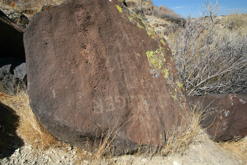 This apparently upside down boulder is rather interesting.  We can't figure out what the inscription is, though.