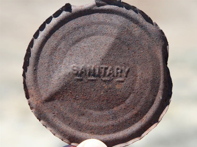 We also find one of the Sanitary can lids from the early 1900's that replaced the hole and cap style lid.