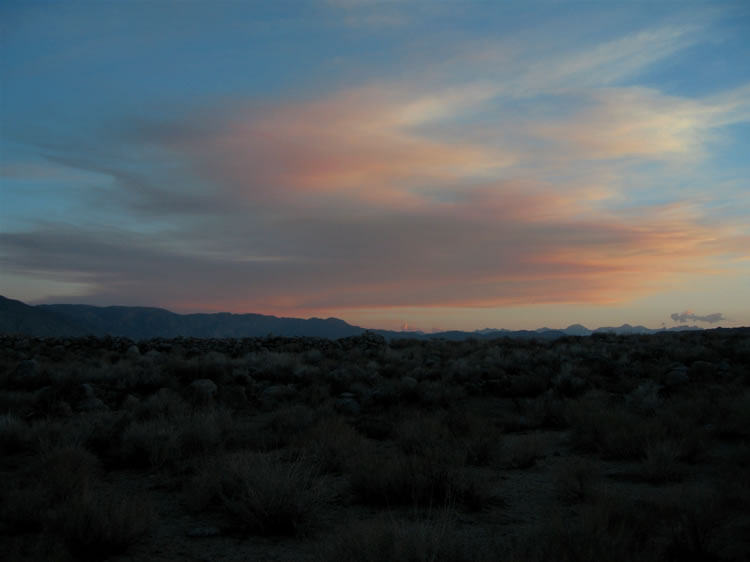 As dusk falls we make a hasty camp among the boulders of White Mountain City and plan our explorations of our rocky surroundings for tomorrow morning.