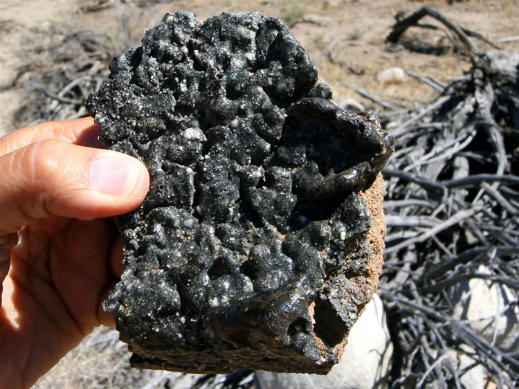 A closer look at the slag coating on the fire clay.