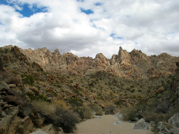 The scenery is made more dramatic by the scudding clouds.