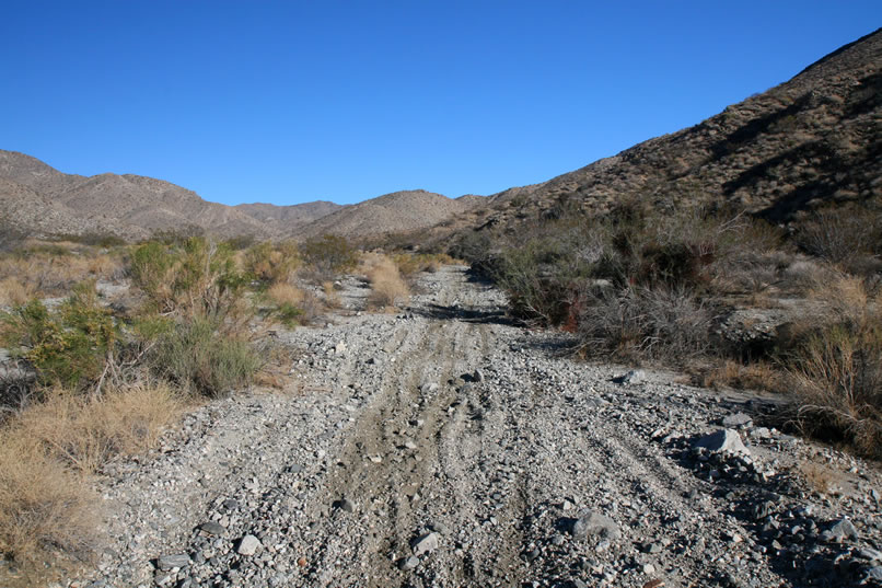 Even though the bikes have torn up the trail, we still make good time.  It's very likely that this is the same route that Chuckawalla Bill used to use to drive up to his rock cabin.