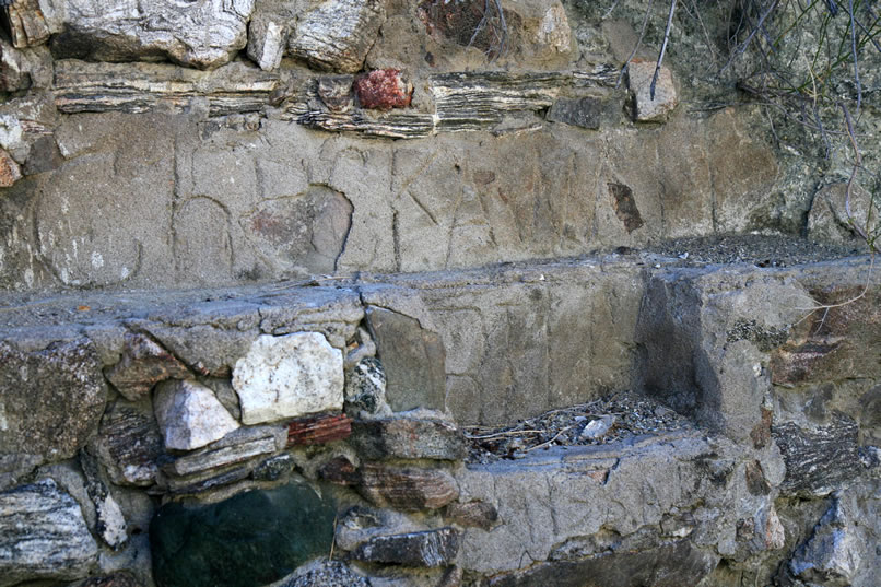 In this closer view we can still see the inscription in the concrete:  Chuckawalla Bill 1933 A.D.