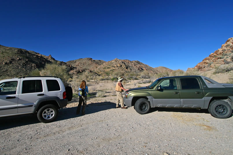 We follow the Cottonwood Springs/Pinto Basin road until we come to the wash where we'll begin our hike to the Coyote Mine.  While Mohave checks out some of the old mills near Cottonwood Springs, the Dzrtgrls will do a bit of route finding and hopefully end up at the Coyote Mine.