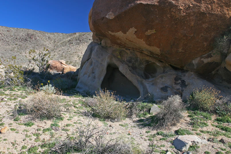 Under the largest of the boulders is a neat little shelter.