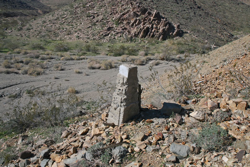 This support pylon remains standing but others have toppled down the slope.