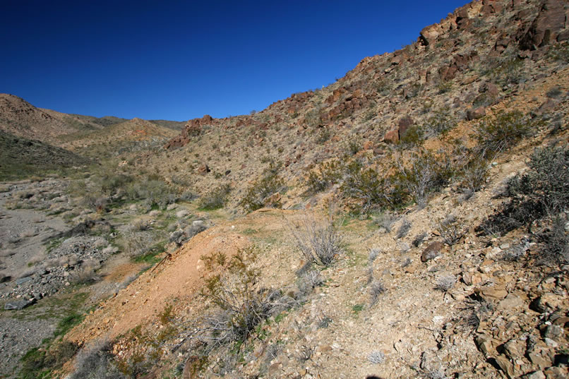 Back outside, we take a trail around the shoulder of the hill to another mine entrance.