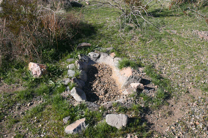 As we prepare to leave, we spot a rock lined cement trough near the old cabin foundation.