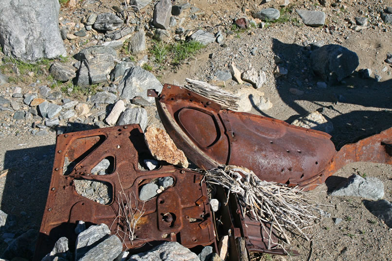 A few more old auto parts are also spotted down in the wash.  It's time now to climb into the vehicles and head down the Pinkham Canyon Trail again.  We're glad that the Snow Cloud turned out to be interesting and photogenic.  Of course anything would look good after the Coyote Mine!