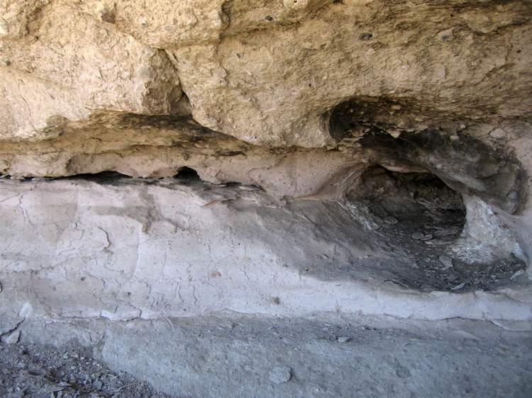 Notice the smoke blackened roof directly above an ancient hearth.