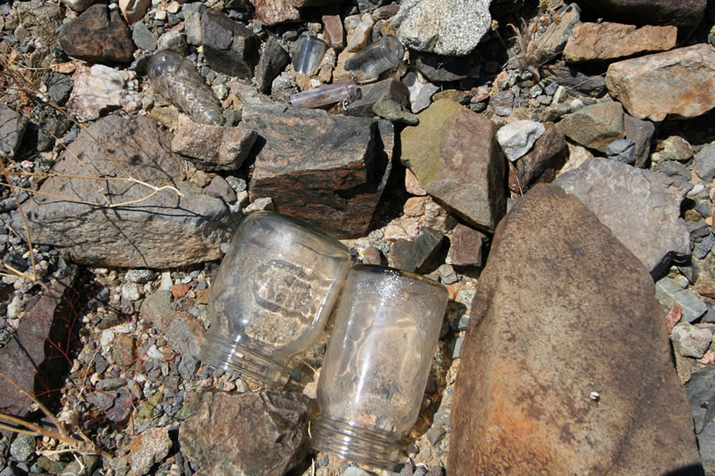 While we're up on the bank taking pics of the cabin, we come across a little cache of bottles.  Remarkably, virtually all of the bottles around the cabin are still intact!