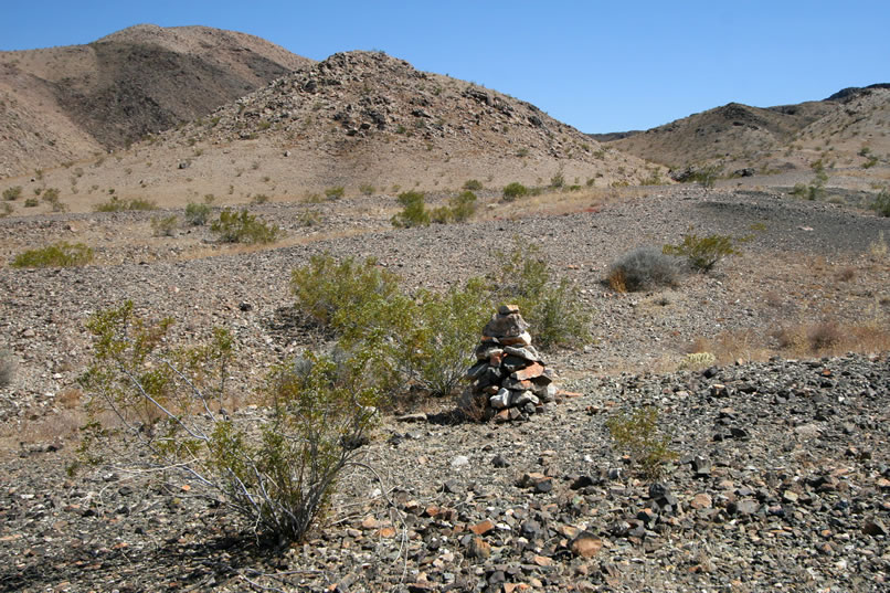 Whoever lived at the cabin and worked the placer claim deserves a shout out for all the well built stone cairns around here!  Little do we know that we've only seen the tip of the stacked stone iceberg!