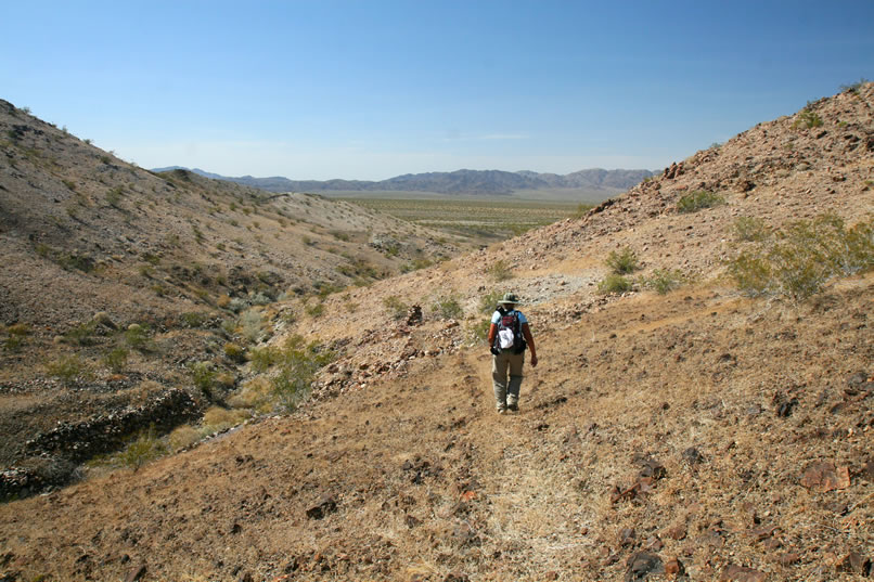 With Jamie in the lead, we slowly make our way back down to Pinto Basin. We have another tough section of washes to cross before we arrive at our final mine of the day. If you're still up for it, grab some cold water from the fridge and a few energy bars. We'll wait for you! Click here for our next leg to the Hard Diggings Mine.