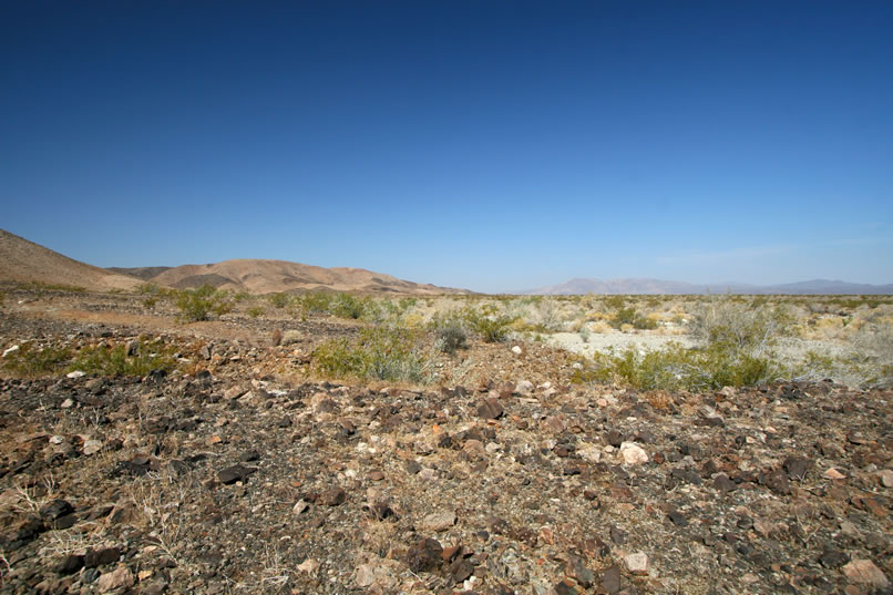 Here's a look back at our route with the Eagle Mountains to the left and Pinto basin to the right.  From this point we're going to do an about face and pick up an old road that seems to be heading toward the canyon that we want.