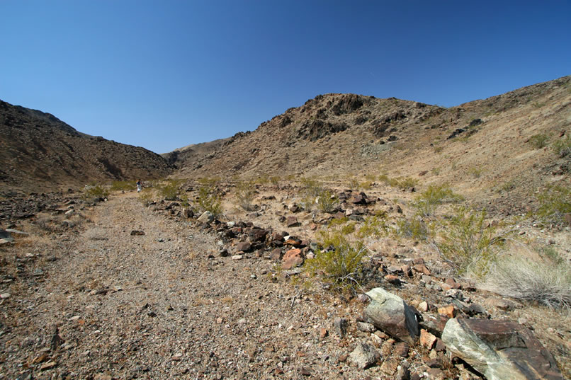 Nearing the mine site, Niki shouts out that she can see some stone foundations.  Already we've noticed the adit and tailings that are visible on the hillside off to the right.