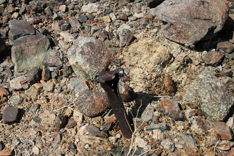 We soon find the metal pipes driven solidly into the ground that would have supported the tent.