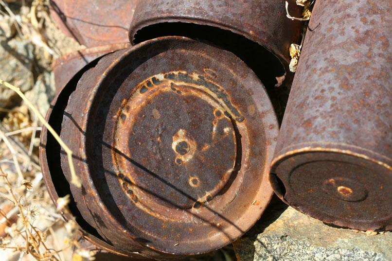 Numerous hole and cap cans also turn up.  These are consistent with the possible 1904 date of the medicine bottle.  It seems likely that this area was being prospected and mined for many years before the 1930's date assigned to it.