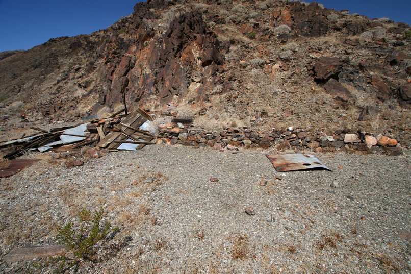 Well, there's our tin cabin!  Unfortunately, we're a bit late to see it in a vertical position!  In the following photos, we'll take you on a tour of the tin cabin site and some of the odds and ends to be found here.