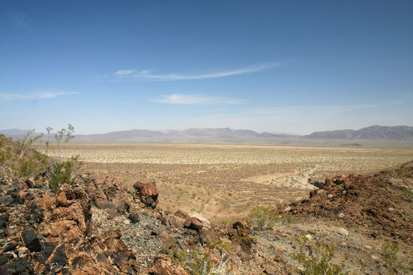 Meanwhile, Niki has gained some serious elevation and gets some great panoramic views down into Pinto Basin.