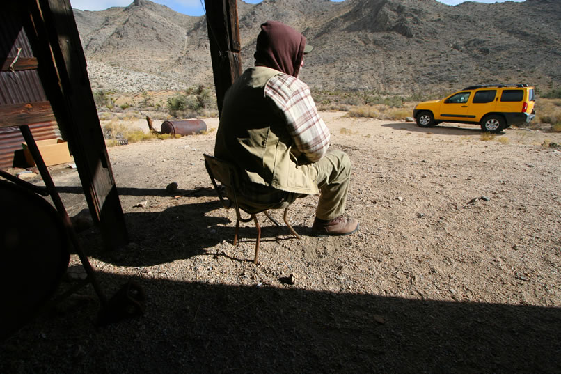 We'll have to admit, we set up this shot with Mohave, who's a big guy, on the tiny little chair that's inside the metal shed.