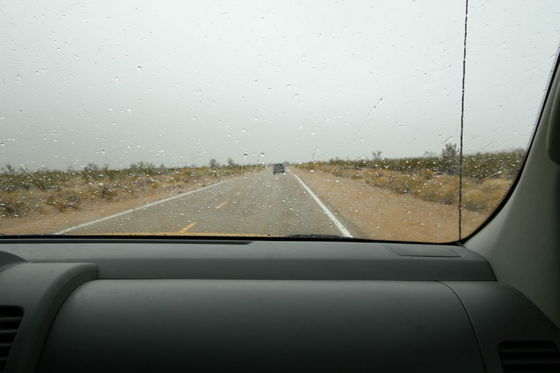 Speaking of action, we hurriedly head for the vehicles as the rain settles in for good.  Here we're on our way down to Cima to see if the store is open.