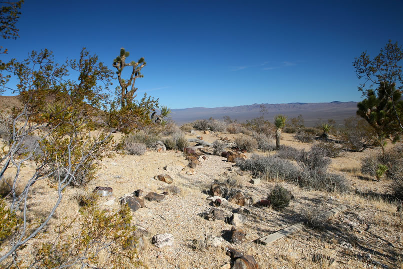 On the move again, our next stop is at the site of the Cuprite Claim and where the Allured Cabin once stood.  Rock lined pathways lead us out to numerous treacherous shafts clad with decaying timbers.