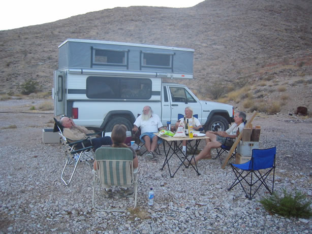 The Desert Explorers swapping stories before dinner.