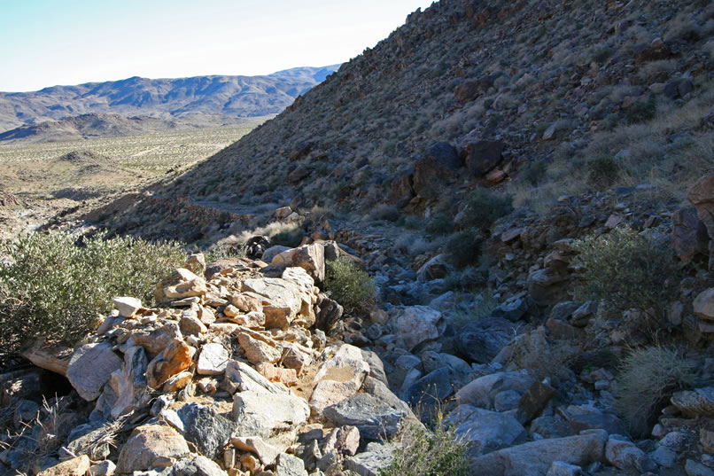 In this view looking back on the section that we've traveled, you can see that erosion has taken its toll on the road.  Many sections are bare boulders and in places entire sections of the road have been washed away.  Still, it's a much better option than the wash below.