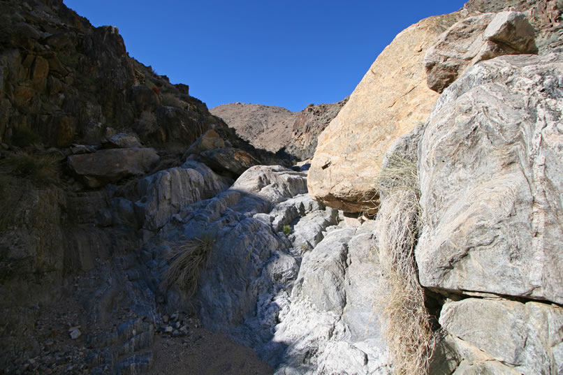 Jamie's route in the wash has its own problems in the form of constant dry falls that need to be negotiated.