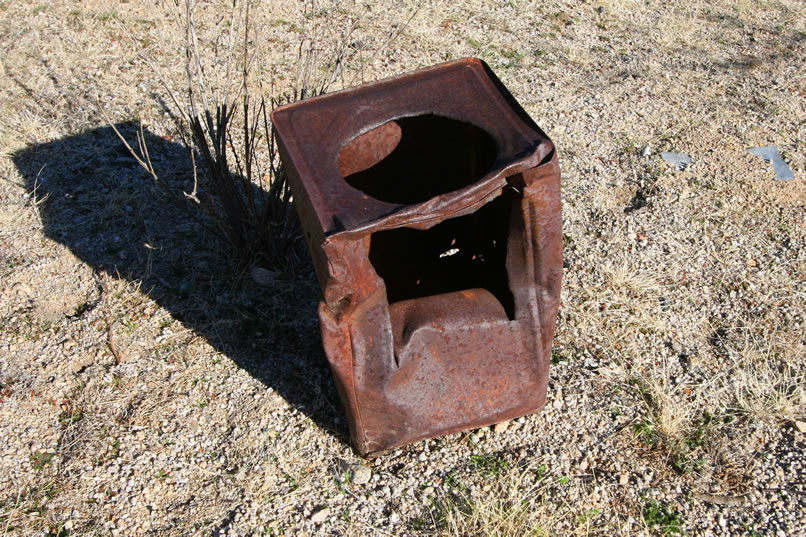 This old tin has been reconfigured into a stove.