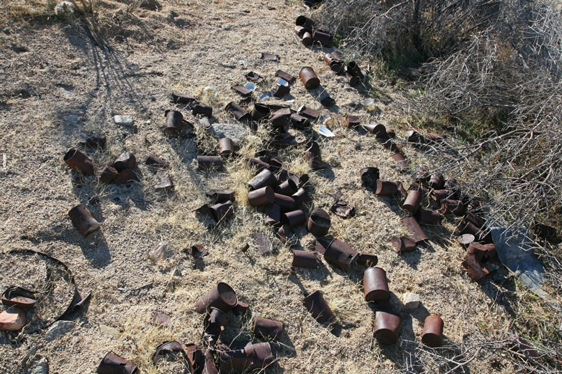 Down near the wash that runs behind the camp area, there are several sizeable trash scatters.