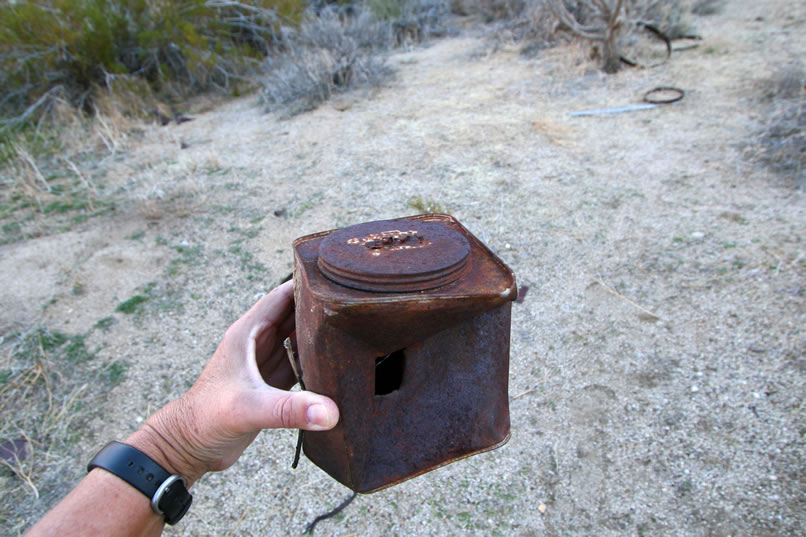 We get side tracked for a second by this interesting old can, but in the next photos you'll get a couple of different views of the furnace.