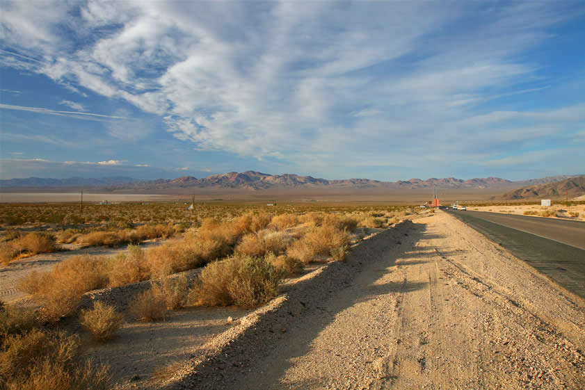 We're a little early for our 8:30 rendezvous at the Fort Irwin Visitor Center so we stop to capture the beautiful desert morning in this shot looking back down Fort Irwin Road.