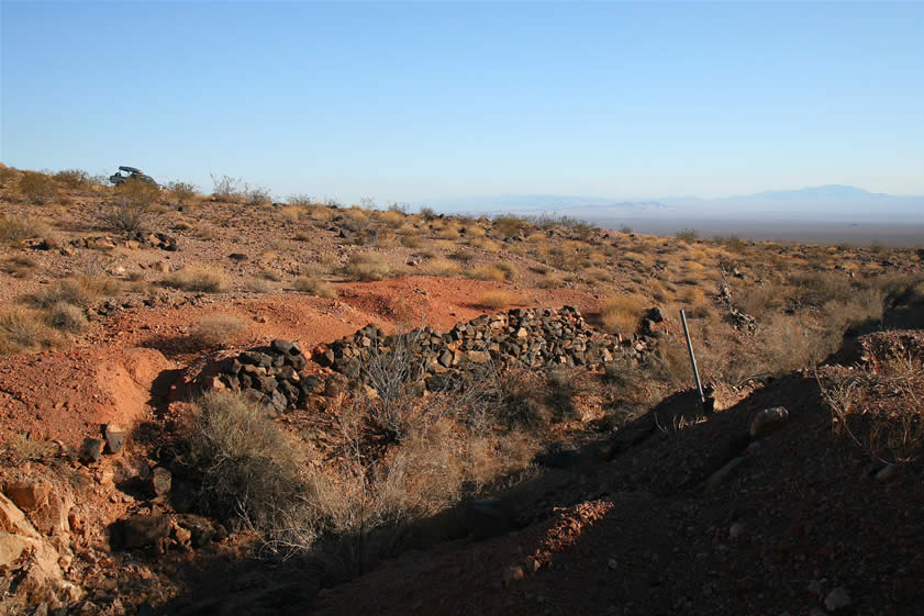 Note the rock wall in the foreground.  You can also see the Lizardmobile on the hillside in the distance.