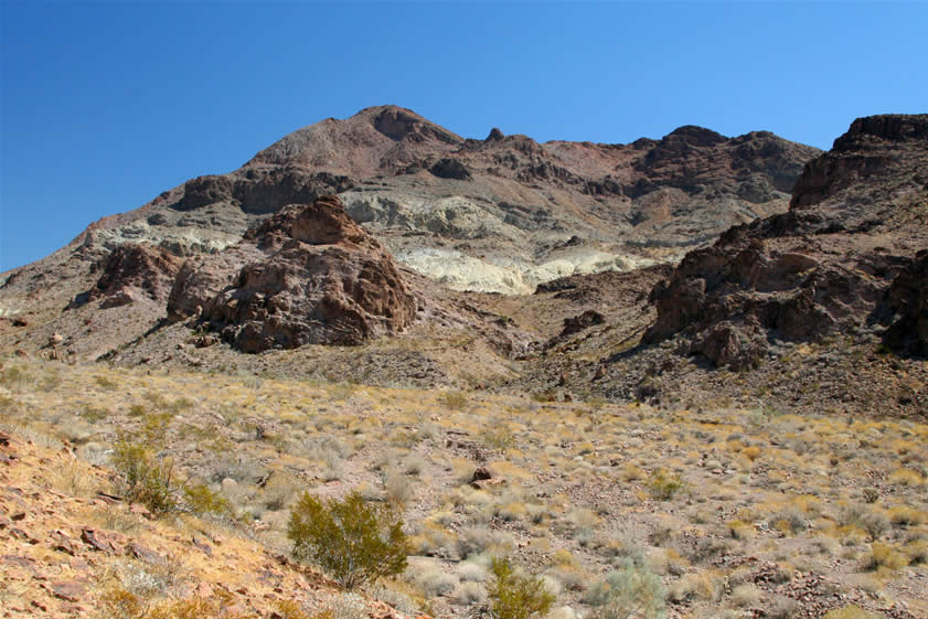 Meanwhile, the Dzrtgrls are crossing the same wash but heading down toward the portion of the Great Gold Belt that was developed in 1909.  This earlier development was then overlayed from 1923 to 1930 with a new flurry of mining and a name change to the Camp Castle Mine.