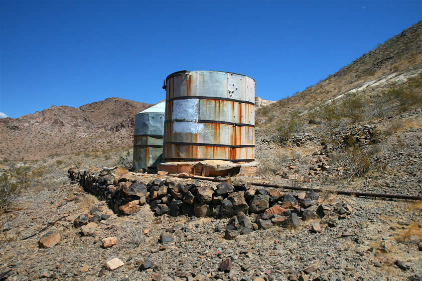 Here are some closer looks at the two tanks.  Note the pipeline leading to them.  We'll follow that next.