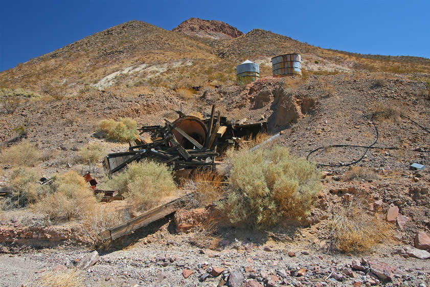 A little further up the wash are the remains of what appears to be a cone crusher.  In fact, scattered all along the wash are hints at old foundations, pieces of equipment and other assorted debris.