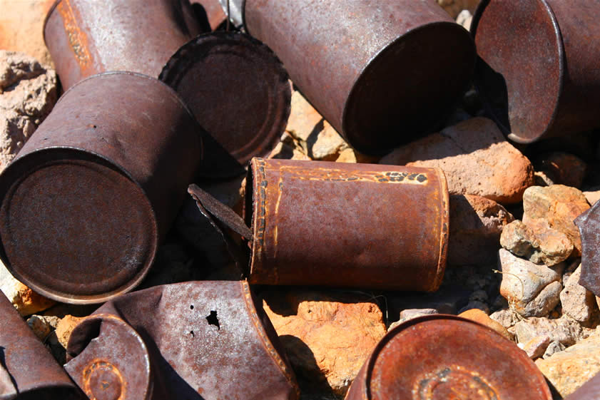 Even though the cabin appears to be more recent, one look at the can dump clearly shows that this area was indeed the site of the 1907 to 1914 earlier phase of the mine.  The hole and cap lid design as well as the crude solder of the top and side seam indicate that many of these cans were from the very early 1900's.