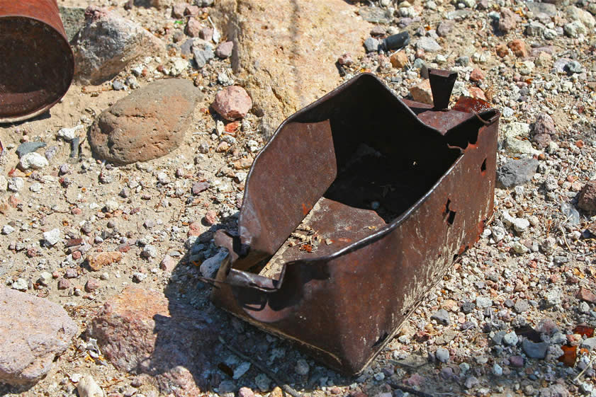 That notion seems to be reinforced as we work our way back up toward the first tunnel that we saw and find further evidence of habitation here.  This is a tobacco tin that was often reused as a lunch pail.