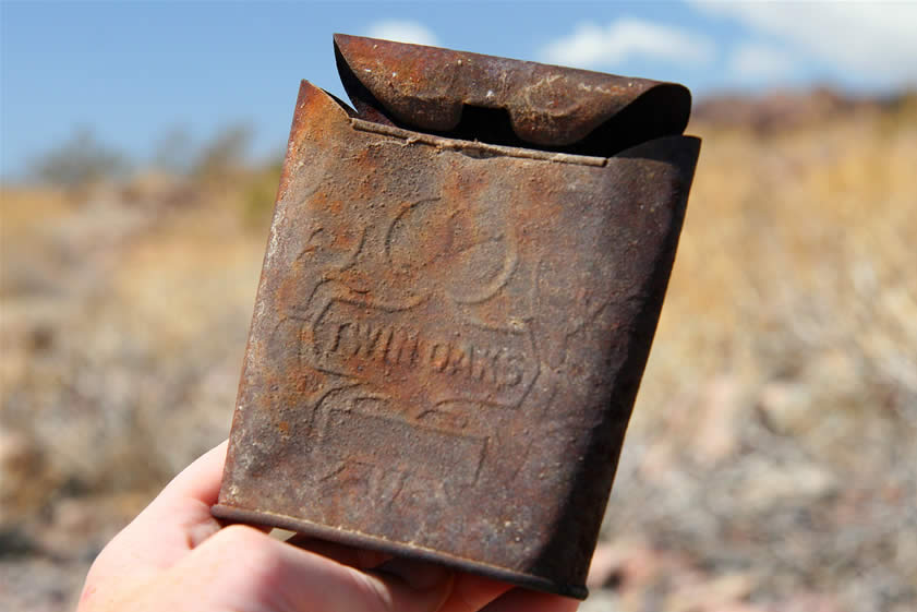 Probably the best trash find of the day is this old Twin Oaks tobacco tin.  It has a very distinctive shape and lots of ornate details.  Since our motto is "Find it, leave it,"  we leave this tin and all other historic artifacts right where we found 'em.  However, we were so impressed with this tin that we hunted around on eBay for one and eventually got the one in the following photos.