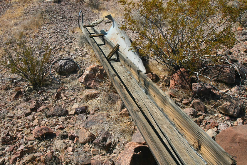 Here's a closer look at one of the sluices.  After Howard rejoins us we decide to explore down from this area in hopes of finding the site of the more modern mill that was constructed and used between 1923 and 1930.  Surely there's still some evidence of that.  If you want to join us for this hunt as well as our first night fluorescent mineral hunt with our new black light, then click HERE.