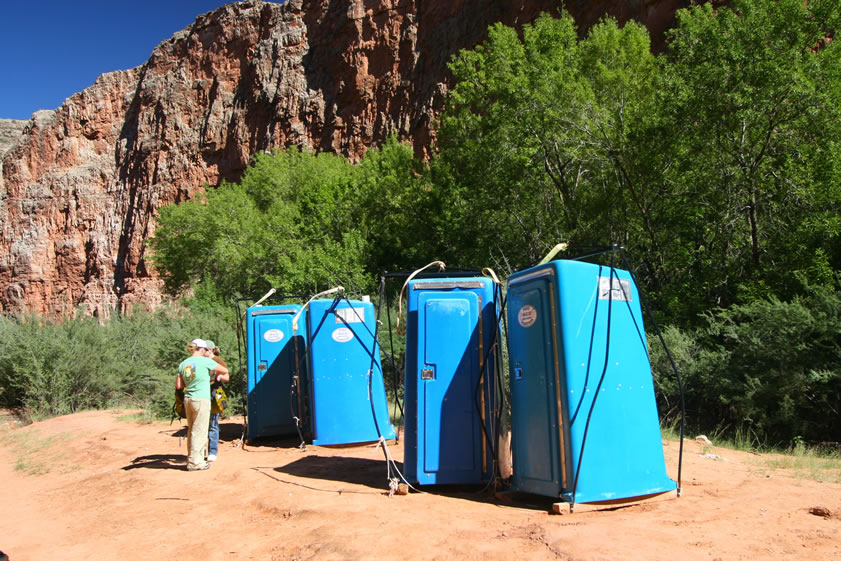 Most of the portable toilets are at the entrance to the campground, but there are also a few as you leave it on the way to Mooney Falls.  Notice the canvas slings, external pipe frames and wood skids.  These toilets can fly!  When they get full the helicopter yanks 'em up one at a time and replaces them with new ones.